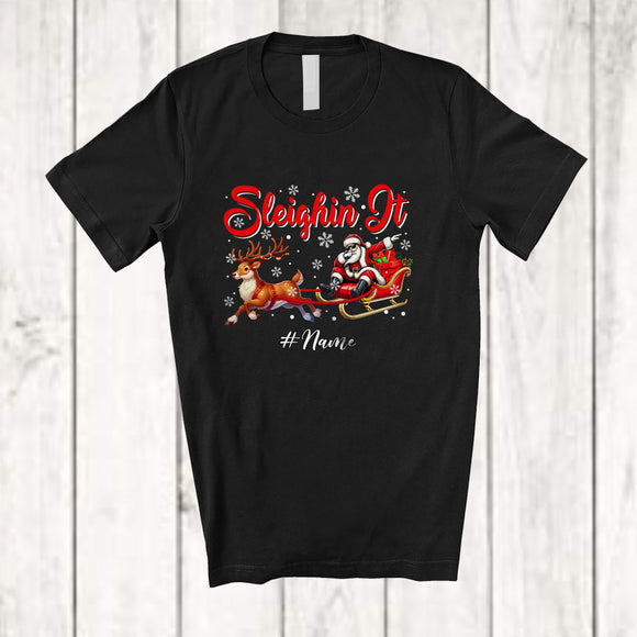 MacnyStore - Personalized Custom Name Sleighin It; Joyful Christmas Santa Dabbing Sleigh Reindeer T-Shirt