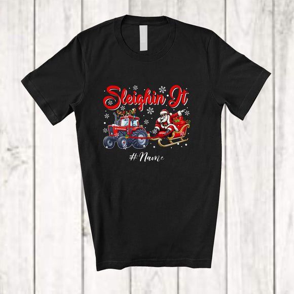 MacnyStore - Personalized Custom Name Sleighin It; Joyful Christmas Santa Dabbing Sleigh Tractor Reindeer T-Shirt