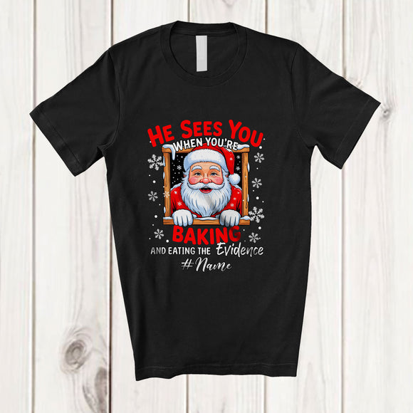 MacnyStore - Personalized Custom Name He Sees You Baking; Humorous Christmas Santa Face; Cookie Baker T-Shirt