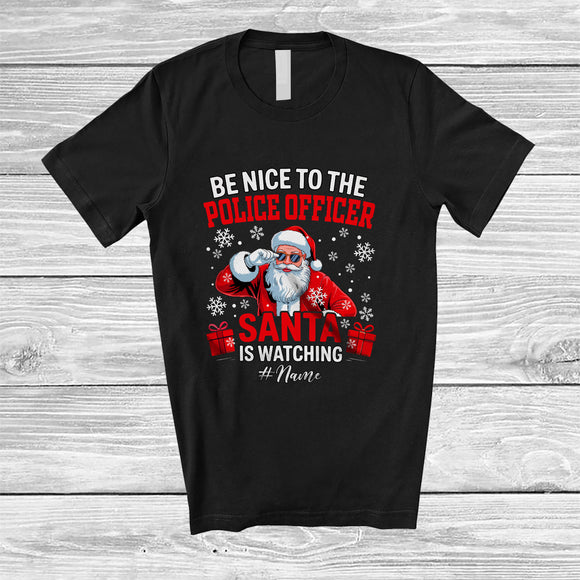 MacnyStore - Personalized Custom Name Nice To Police Officer Santa Watching; Lovely Christmas Snowing Jobs T-Shirt