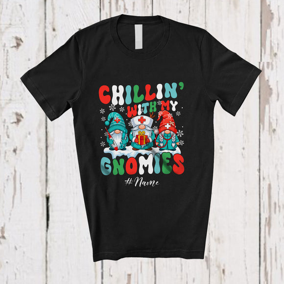 MacnyStore - Personalized Custom Name Chillin' With Gnomies; Amazing Christmas Groovy Three Gnomes Nurse T-Shirt