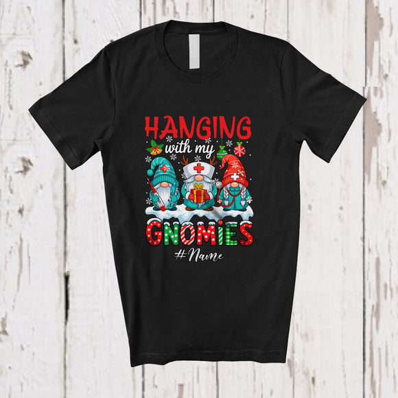 MacnyStore - Personalized Custom Name Hanging With Gnomies; Amazing Christmas Three Gnomes Nurse T-Shirt