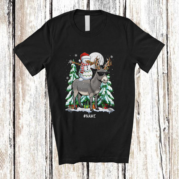 MacnyStore - Personalized Custom Name Dabbing Snowman Riding Donkey Reindeer; Lovely Christmas Farmer T-Shirt