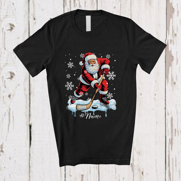 MacnyStore - Personalized Custom Name Black Afro African Santa Playing Hockey; Joyful Christmas Sport Player T-Shirt