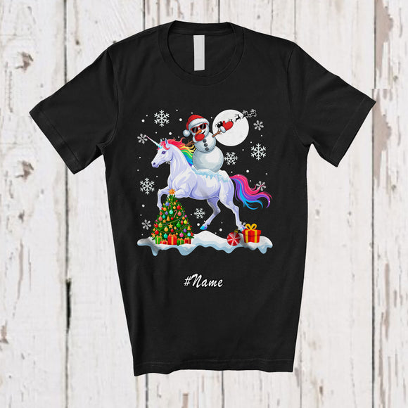 MacnyStore - Personalized Custom Name Dabbing Snowman Riding Unicorn; Cheerful Christmas Snow Animal T-Shirt