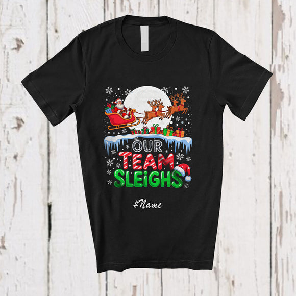 MacnyStore - Personalized Custom Name Our Team Sleighs; Amusing Christmas Moon Santa Sleigh Reindeer T-Shirt