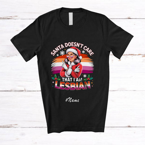 MacnyStore - Personalized Custom Name Santa Doesn't Care Lesbian; Lovely Christmas LGBTQ Pride Family T-Shirt