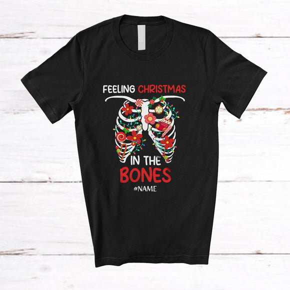 MacnyStore - Personalized Custom Name Feeling Christmas In The Bones; Joyful X-mas Lights Skeleton Rib X-Ray T-Shirt