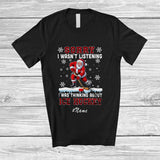 MacnyStore - Personalized Custom Name I Wasn't Listening Ice Hockey; Joyful Christmas Santa Playing Player T-Shirt
