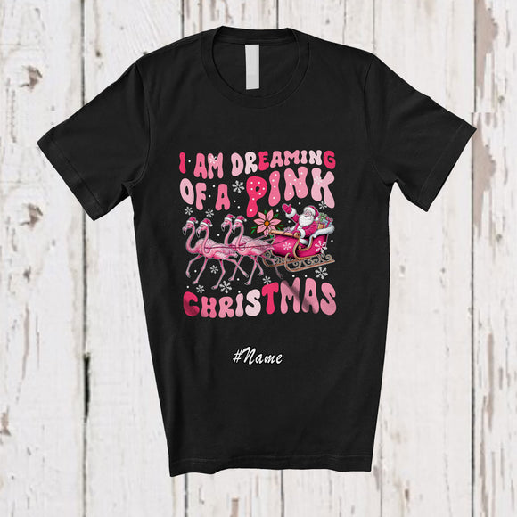 MacnyStore - Personalized Custom Name Dreaming Of A Pink Christmas; Lovely Santa Sleigh Flamingo Reindeer T-Shirt