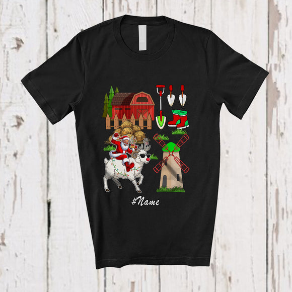MacnyStore - Personalized Custom Name Santa Farmer Riding Sheep Reindeer; Humorous Christmas Farming T-Shirt
