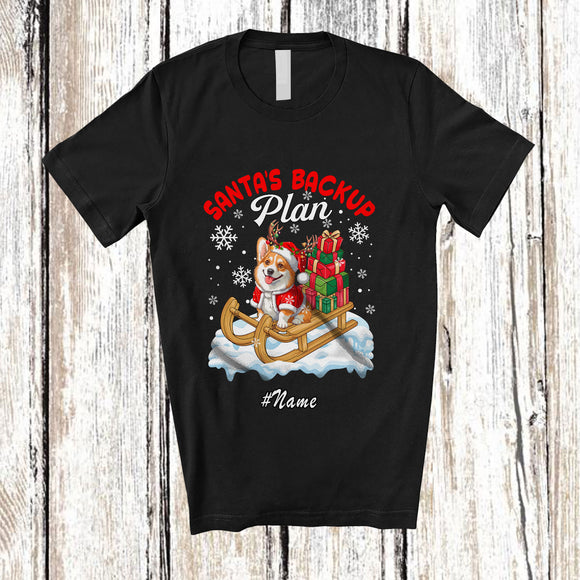 MacnyStore - Personalized Custom Name Santa's Backup Plan; Lovely Christmas Santa Sleigh Reindeer Corgi T-Shirt