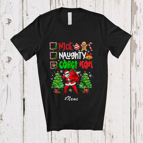 MacnyStore - Personalized Custom Name Nice Naughty Corgi Mom; Lovely Christmas Trees Dabbing Santa T-Shirt