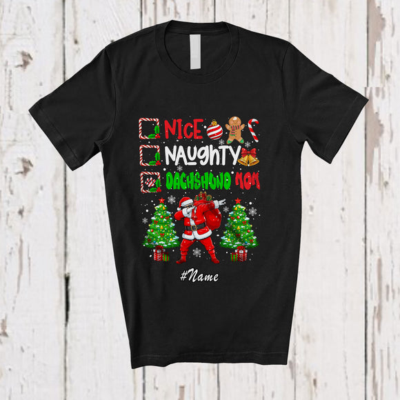 MacnyStore - Personalized Custom Name Nice Naughty Dachshund Mom; Lovely Christmas Trees Dabbing Santa T-Shirt