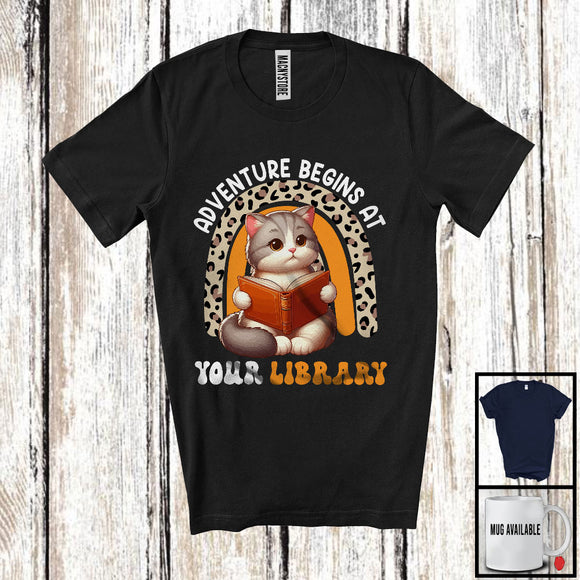 MacnyStore - Adventure Begins At Your Library, Adorable Cat Reading Book, Summer Leopard Rainbow T-Shirt