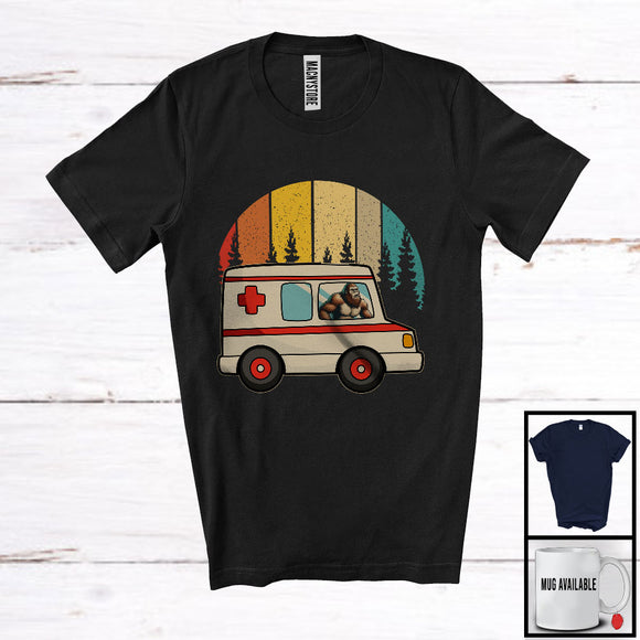 MacnyStore - Bigfoot Driving Ambulance; Humorous Vintage Retro Sasquatch Bigfoot; Group Of Vehicles T-Shirt