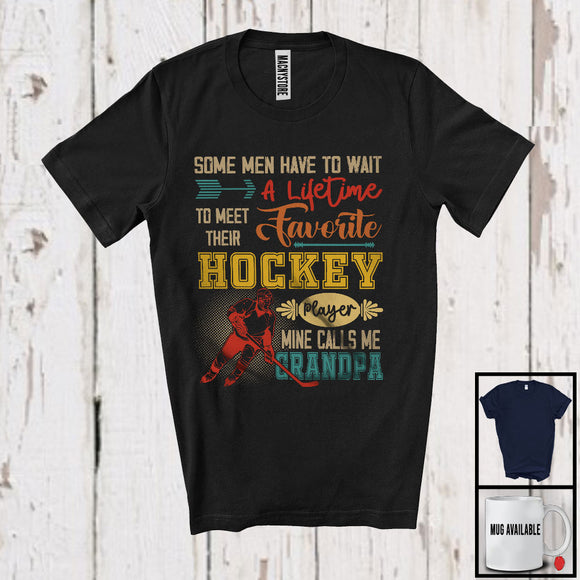 MacnyStore - Meet Their Favorite Hockey Player Calls Me Grandpa, Happy Father's Day Vintage, Sport Family T-Shirt