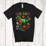 MacnyStore - Personalized 100 Days of School And Still Loving It; Awesome Custom Name T-Rex Holding Heart T-Shirt