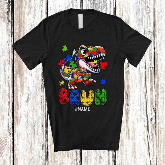 MacnyStore - Personalized Bruh Autism Awareness; Colorful Puzzle Piece Custom Name T-Rex; Family T-Shirt