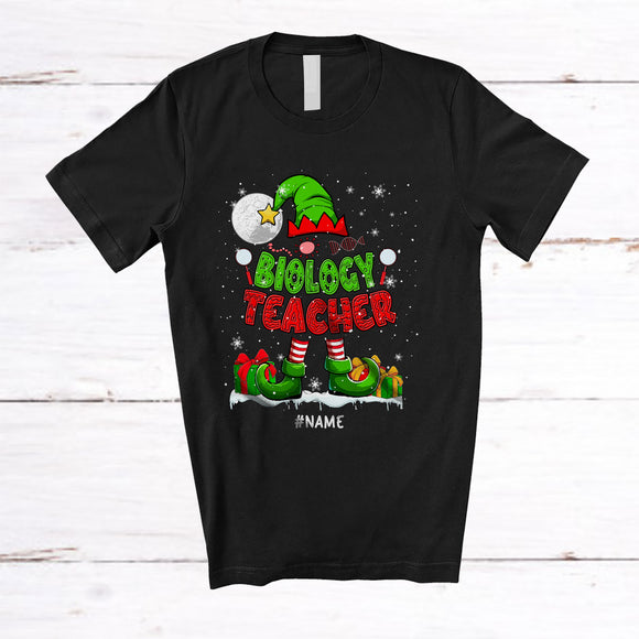 MacnyStore - Personalized Custom Name Biology Teacher; Lovely Christmas Elf Snowing Book Education Jobs T-Shirt