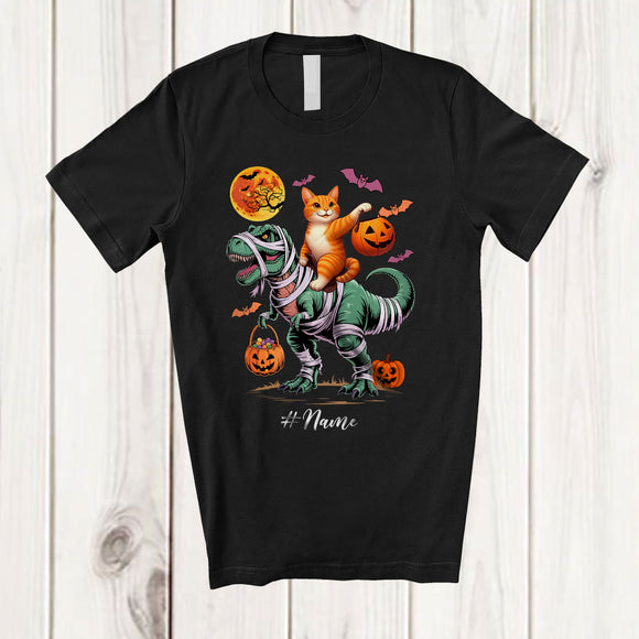 MacnyStore - Personalized Custom Name Cat Riding T-Rex Mummy; Scary Halloween Dinosaur Cosplay; Family T-Shirt