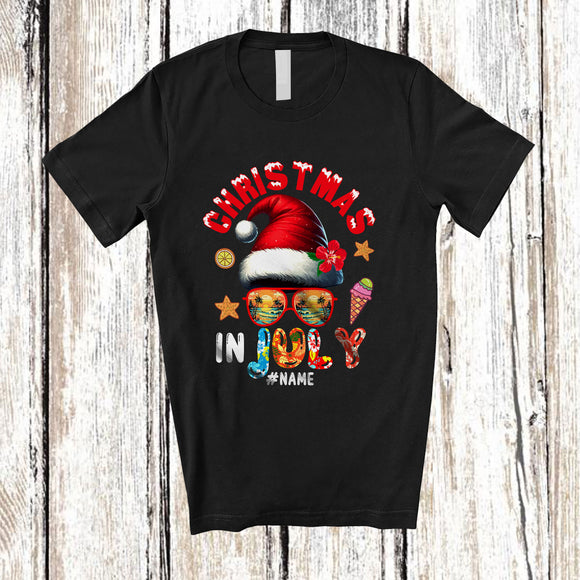 MacnyStore - Personalized Custom Name Christmas In July; Joyful Summer Vacation Santa Hat; Sea Beach T-Shirt