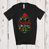 MacnyStore - Personalized Custom Name Christmas In July; Lovely Summer Vacation Hawaiian Family Elf Sunglasses  T-Shirt