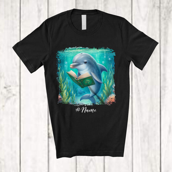 MacnyStore - Personalized Custom Name Dolphin Reading Book; Lovely Teacher Librarian Book Nerd; Sea Animal T-Shirt
