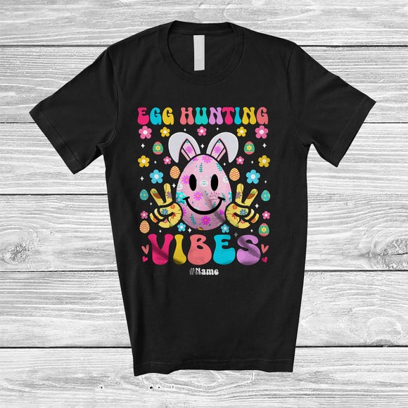 MacnyStore - Personalized Custom Name Egg Hunting Vibes; Lovely Easter Floral Bunny Face; Flowers Family T-Shirt