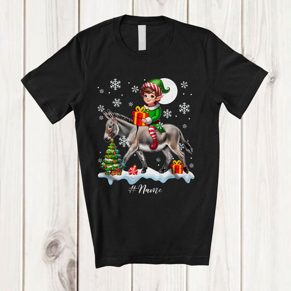 MacnyStore - Personalized Custom Name Elf Riding A Donkey; Amazing Christmas Snowing Donkey Farm Farmer T-Shirt