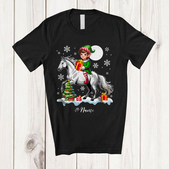 MacnyStore - Personalized Custom Name Elf Riding A Horse; Amazing Christmas Snowing Horse Farm Farmer T-Shirt