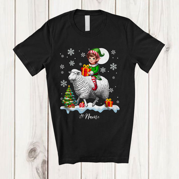 MacnyStore - Personalized Custom Name Elf Riding A Sheep; Amazing Christmas Snowing Sheep Farm Farmer T-Shirt