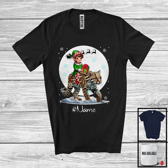 MacnyStore - Personalized Custom Name Elf Riding Ocelot, Joyful Christmas Moon Snow Ocelot, X-mas Team T-Shirt