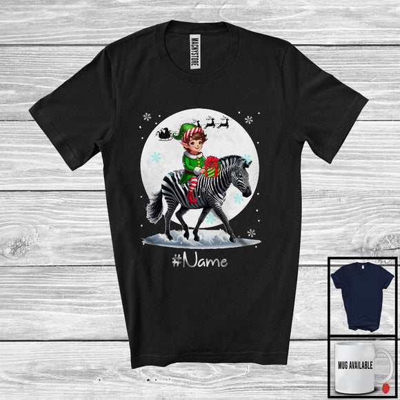 MacnyStore - Personalized Custom Name Elf Riding Zebra, Joyful Christmas Moon Snow Zebra, X-mas Team T-Shirt