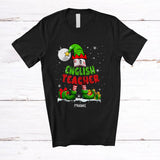 MacnyStore - Personalized Custom Name English Teacher; Lovely Christmas Elf Snowing Book Education Jobs T-Shirt
