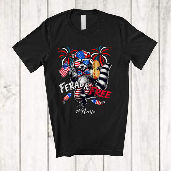MacnyStore - Personalized Custom Name Feral and Free; Humorous 4th Of July US Flag Raccoon Hotdog; Patriotic T-Shirt