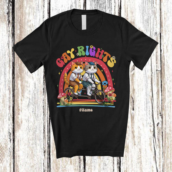 MacnyStore - Personalized Custom Name Gay Rights; Adorable LGBTQ Couple Cats Riding Bicycle Rainbow T-Shirt