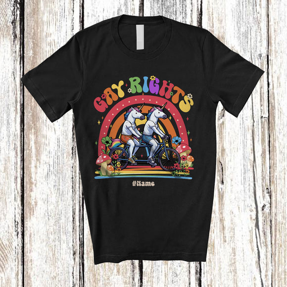 MacnyStore - Personalized Custom Name Gay Rights; Adorable LGBTQ Couple Unicorns Riding Bicycle Rainbow T-Shirt