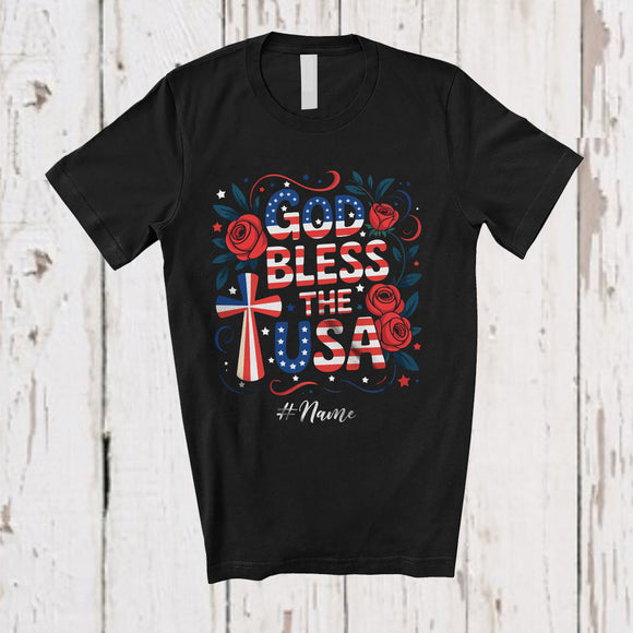 MacnyStore - Personalized Custom Name God Bless The USA; Proud 4th of July US Flag Cross Flowers; Patriotic T-Shirt