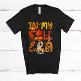 MacnyStore - Personalized Custom Name In My Fall Era; Adorable Thanksgiving Plaid Fall Leaves Pumpkins T-Shirt