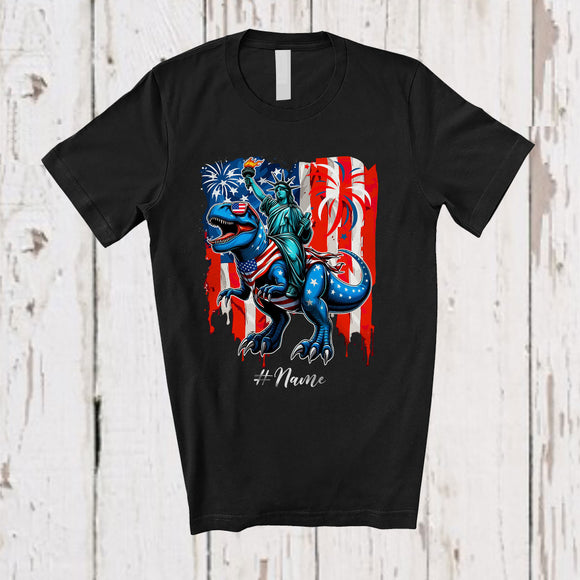 MacnyStore - Personalized Custom Name Liberty Riding T-Rex Dinosaur; Proud 4th Of July US Flag; Patriotic T-Shirt