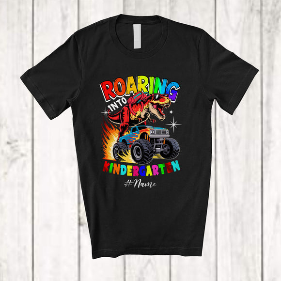 MacnyStore - Personalized Custom Name Roaring Into Kindergarten; Joyful Back To School T-Rex On Monster Truck T-Shirt