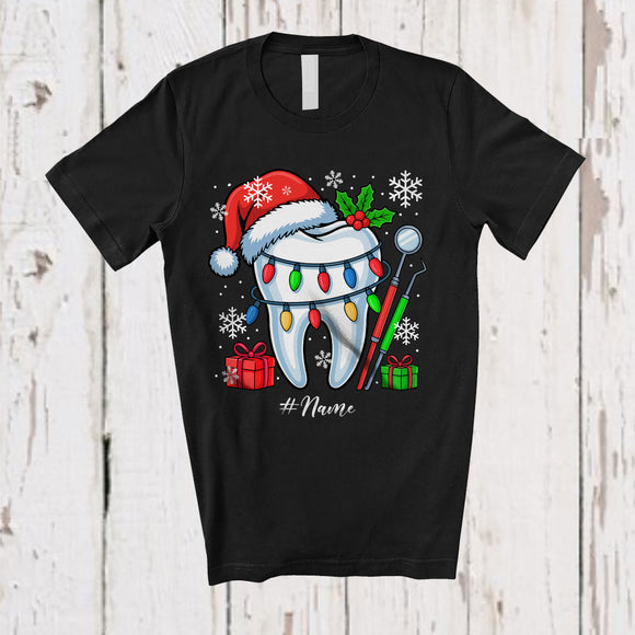 MacnyStore - Personalized Custom Name Santa Hat Tooth; Joyful Christmas Assistant Dental Hygiene Dentist T-Shirt