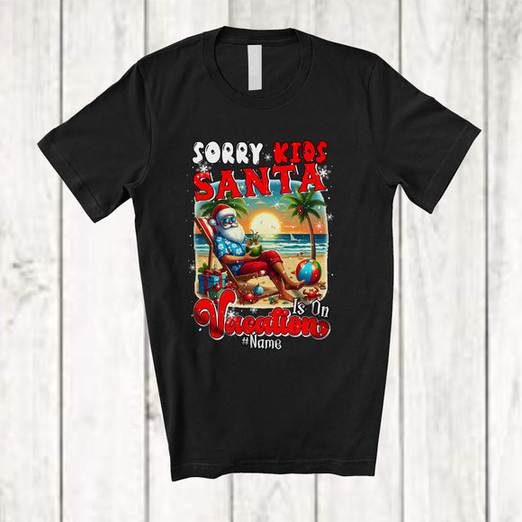MacnyStore - Personalized Custom Name Santa Is On Vacation; Joyful Christmas Summer Hawaii Beach T-Shirt