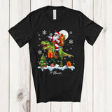 MacnyStore - Personalized Custom Name Santa Riding A T-Rex; Amazing Christmas Snowing T-Rex Wild Animal T-Shirt