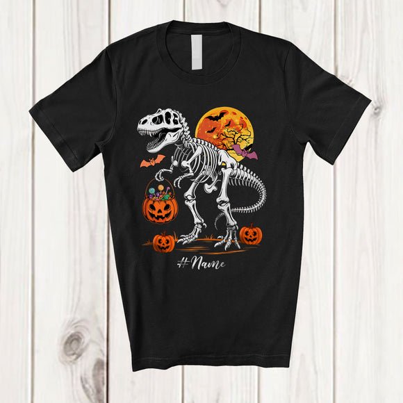 MacnyStore - Personalized Custom Name Skeleton T-Rex; Creepy Halloween Moon Pumpkin Candy; Boys Family T-Shirt