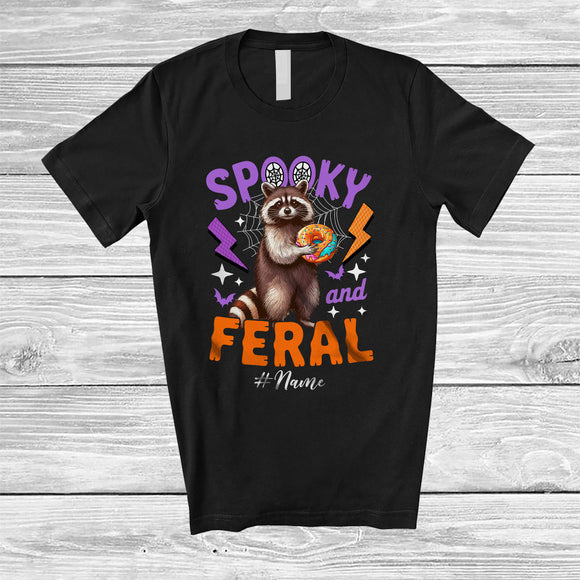 MacnyStore - Personalized Custom Name Spooky And Feral; Lovely Halloween Raccoon Raccoon Eating Donut T-Shirt