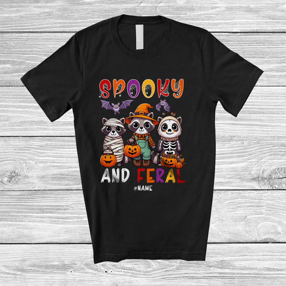 MacnyStore - Personalized Custom Name Spooky And Feral; Lovely Halloween Three Raccoon Mummy Witch T-Shirt