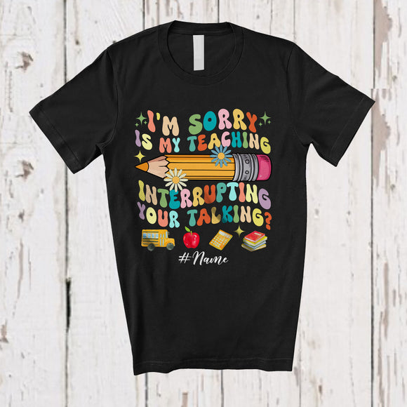 MacnyStore - Personalized Custom Name Teaching Interrupting Your Talking; Lovely Back To School Groovy Teacher T-Shirt