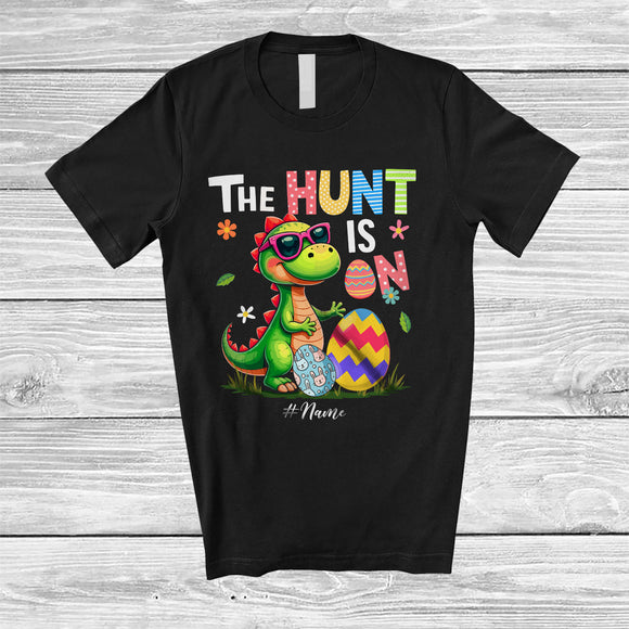 MacnyStore - Personalized Custom Name The Hunt Is On; Colorful Easter T-Rex Dinosaur Sunglasses; Egg Hunt T-Shirt